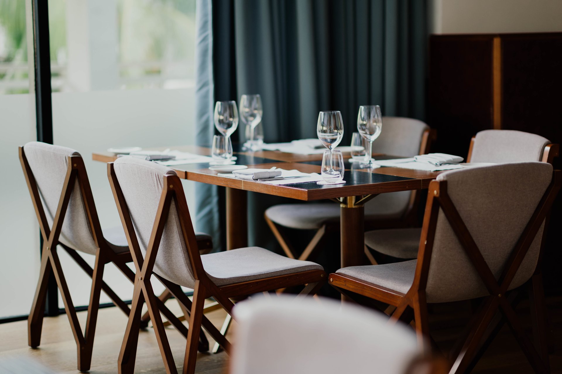 indoor-with-elegant-wooden-dining-table-chairs.jpg